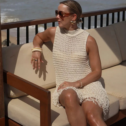 Robe courte élégante en tricot à pompons ajourés pour femme